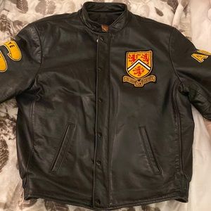 Black vintage varsity leather man jacket that fits a comfortable medium to large